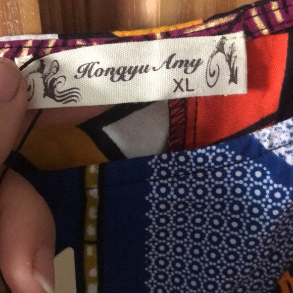 NWT Multi Color Tribal Mixed- print Short Sleeve Top Zip at back neck Women's XL - Picture 4 of 9